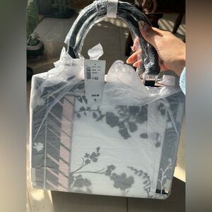 Cute small black white and pink floral handbag